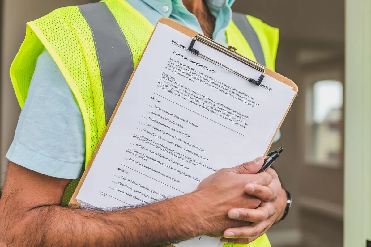 A quality inspector checking goods on site