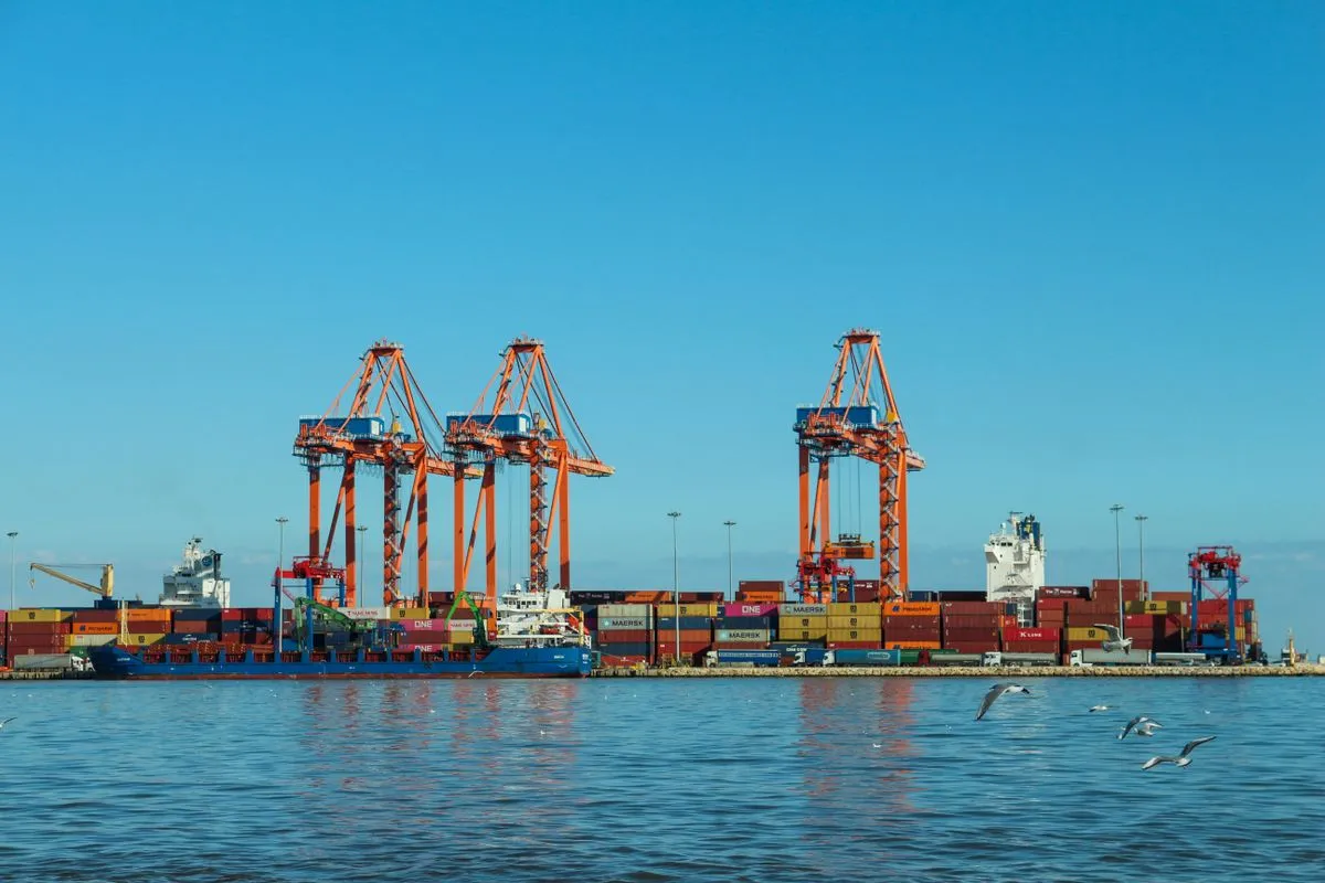 A container ship loading at port