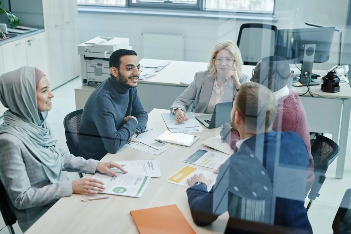 A named account manager reviewing an order with a client