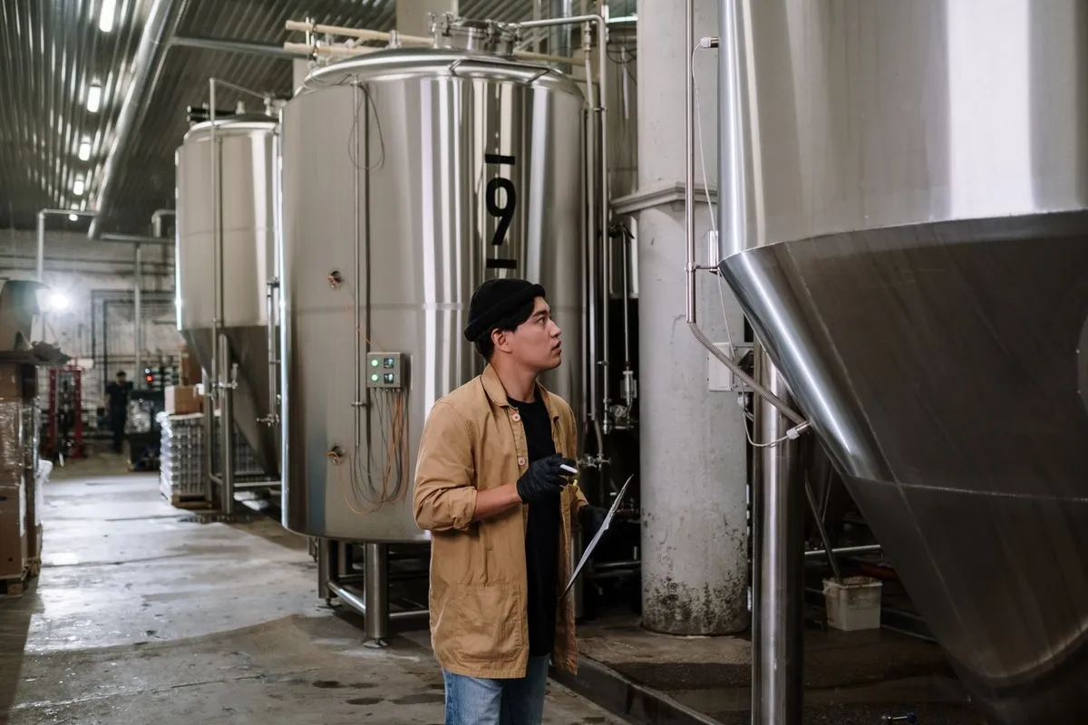 A FABWIN team member walking a supplier factory floor